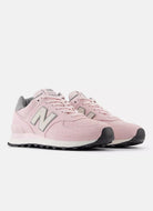 New Balance Women's 574 Sneaker in Rose Sugar Angled Side View