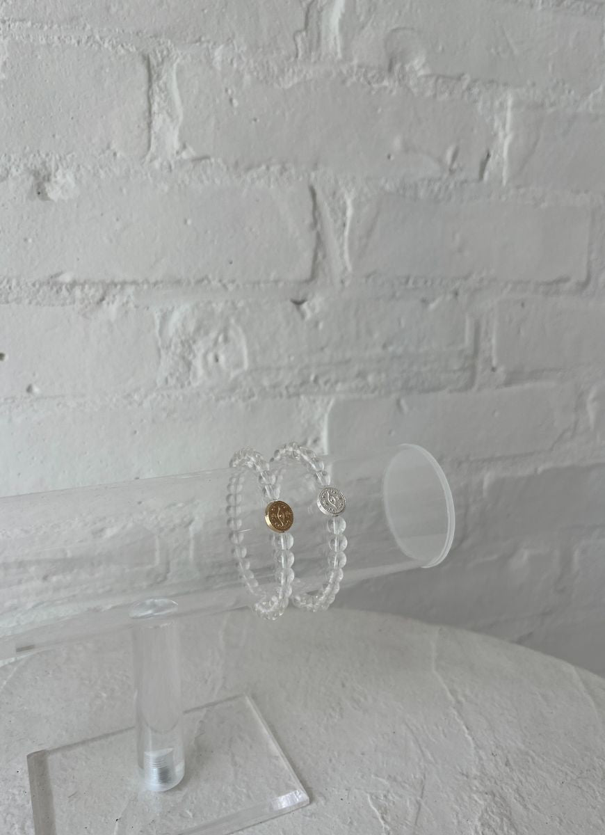Lo & Co Jewelry Clear Abundance Bracelet Shown on Clear Stand on Table