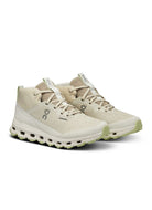 ON Women's Cloudroam Waterproof Sneaker Boot in Ice Limelight Angled Side View