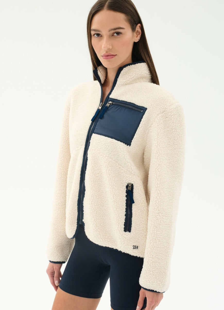 Splits59 Harris Sherpa Jacket in Creme/Indigo Front and Side View