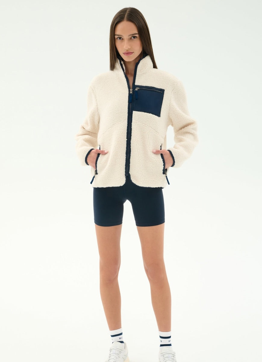 Splits59 Harris Sherpa Jacket in Creme/Indigo Full Length Front View With Hands in Pockets