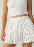Beyond Yoga If You Pleats Mini Tennis Skirt in White Close Up Front View