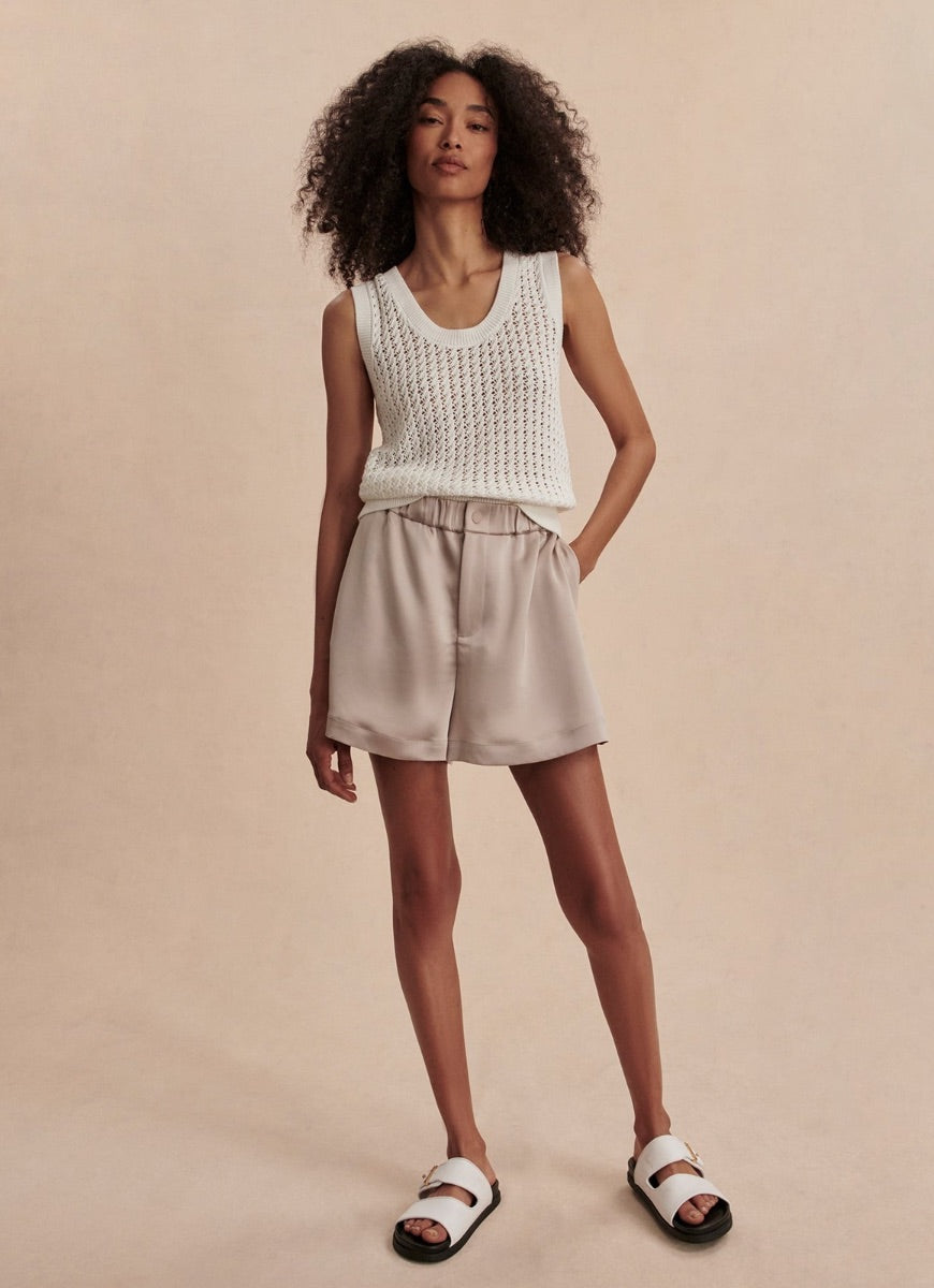 Varley Sakara High Rise Short 4” in Silver Cloud Front View With Hand in Pocket