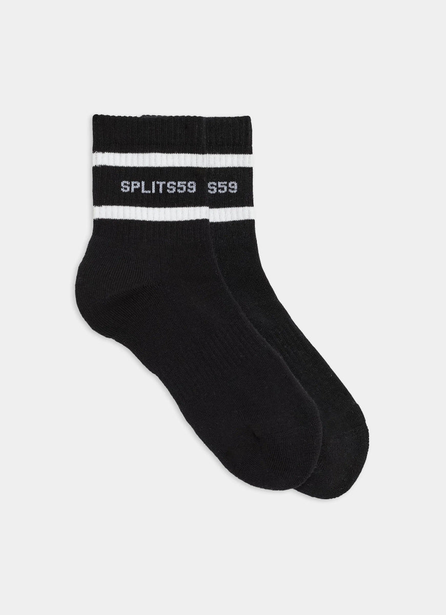 Black socks with white stripes and 'SPLITS59' branding on a light gray background