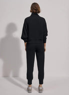 Varley The Slim Cuff Pant 25” in Black Full Back View
