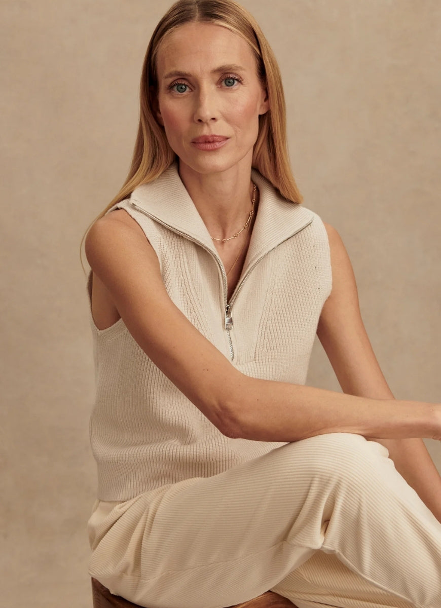 Varley Amina Half Zip Knit in Silver Birch Front View With Model Sitting Down