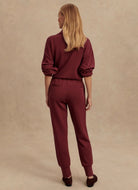 Varley The Slim Cuff Pant 27.5” in New Maroon Full Length Back View