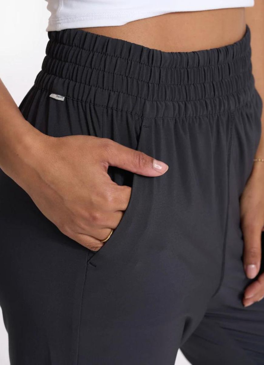 Vuori Women's Villa Jogger in Black Close Up View with Hand in Pocket