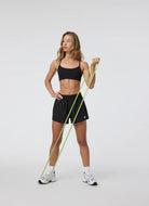 Vuori AllTheFeels Sports Bra in Black Model Shown Training With Bands