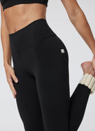 Vuori AllTheFeels Legging in Black Close Up Side View