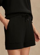 Varley Atrium High-Rise Women's Short 4.5" in Black Close Up View of Hand in Pocket