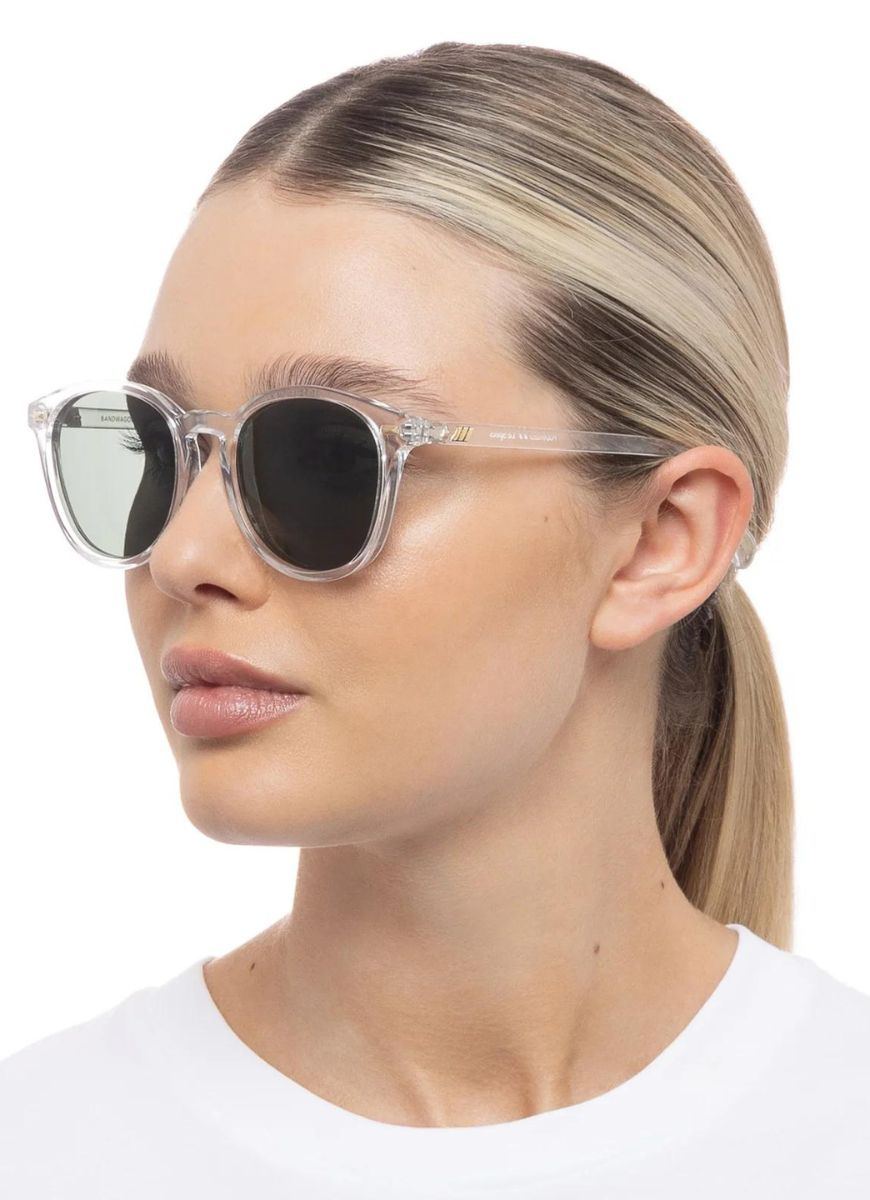 Le Specs Bandwagon Polarized Sunglasses in Crystal Clear Side View Shown Worn by Model