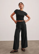 Beyond Yoga Easy Wide Leg Pant in True Black Full Length Front View