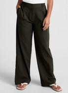 Beyond Yoga Status Wide Leg Trousers in Olive Ink Front View