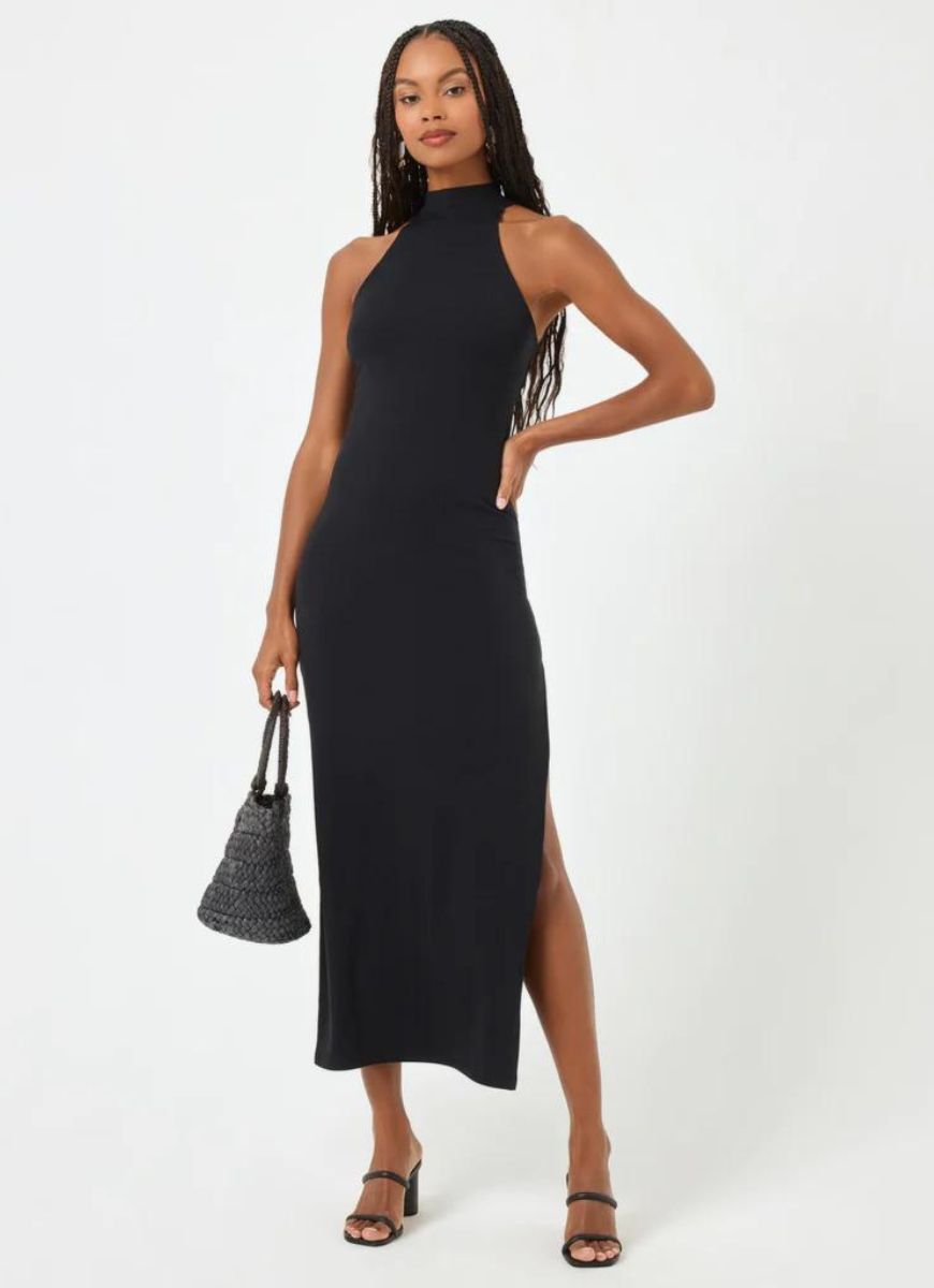 LSPACE Cherie Ribbed Dress in Black Front View with Model Holding a Purse