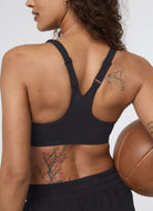 Vuori Dynamic Sports Bra in Black Close Up Back View
