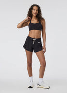 Vuori Dynamic Sports Bra in Black Full Length Front View