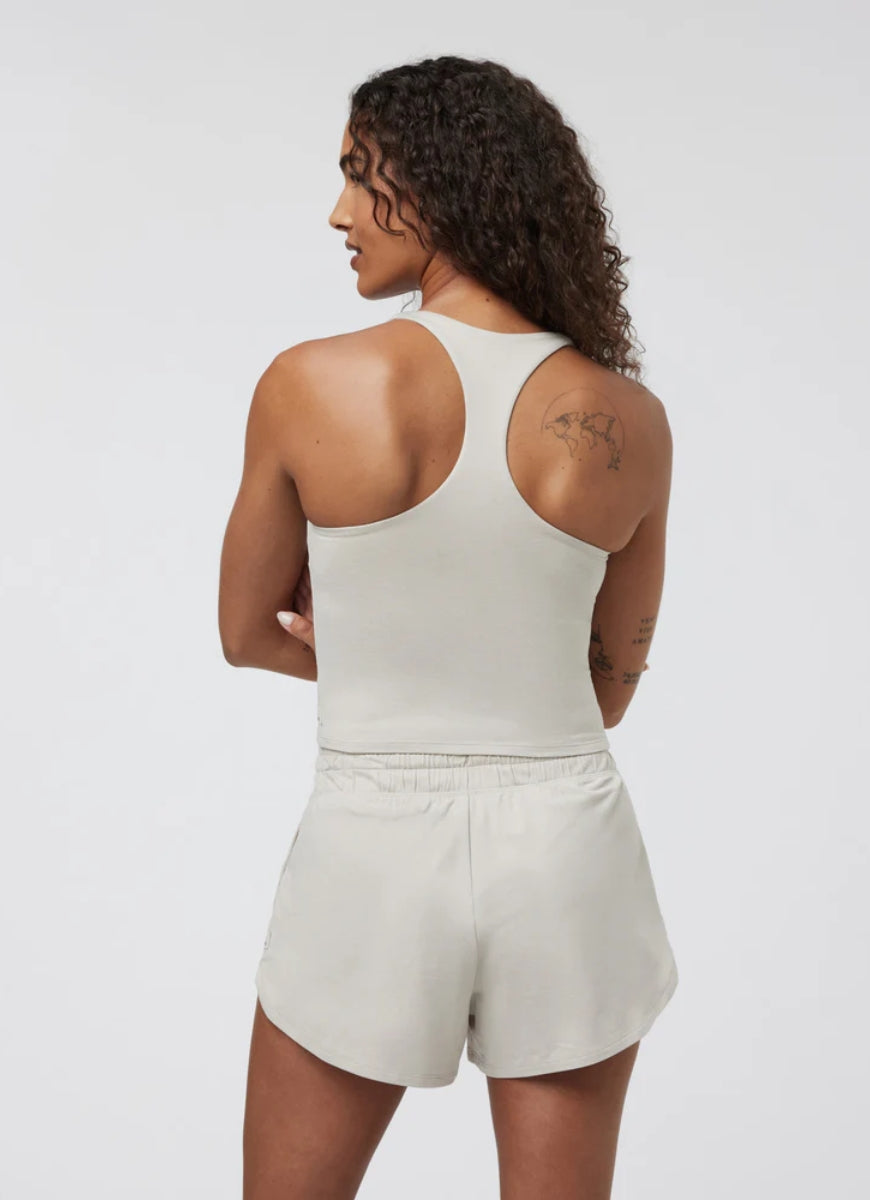 Vuori Halo Performance Crop Tank 2.0 in Ecru Heather Back View