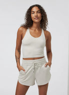 Vuori Halo Performance Crop Tank 2.0 in Ecru Heather