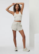 Vuori Halo Performance Crop Tank 2.0 in Ecru Heather Alternate Full Length Front View