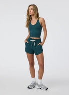 Vuori Halo Performance Crop Tank 2.0 in Moss Heather Full Length Front View