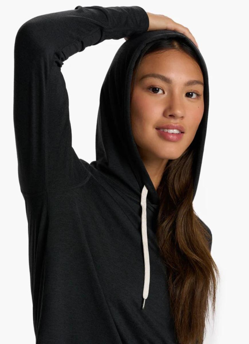 vuori Women's Halo Essential Hoodie in Black Heather Close Up Front View With Hood Up