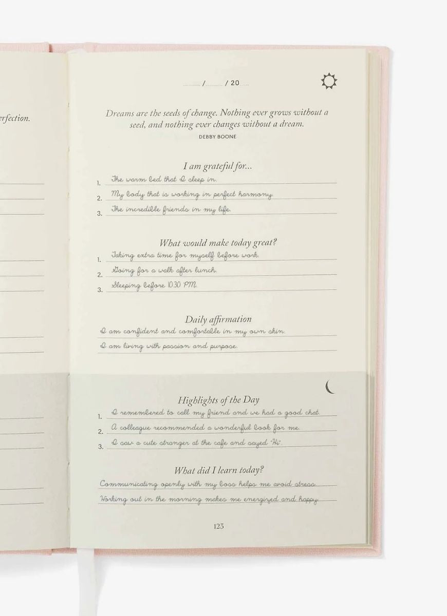 Intelligent Change The Five Minute Journal in Blush Pink Shown Open to a Page