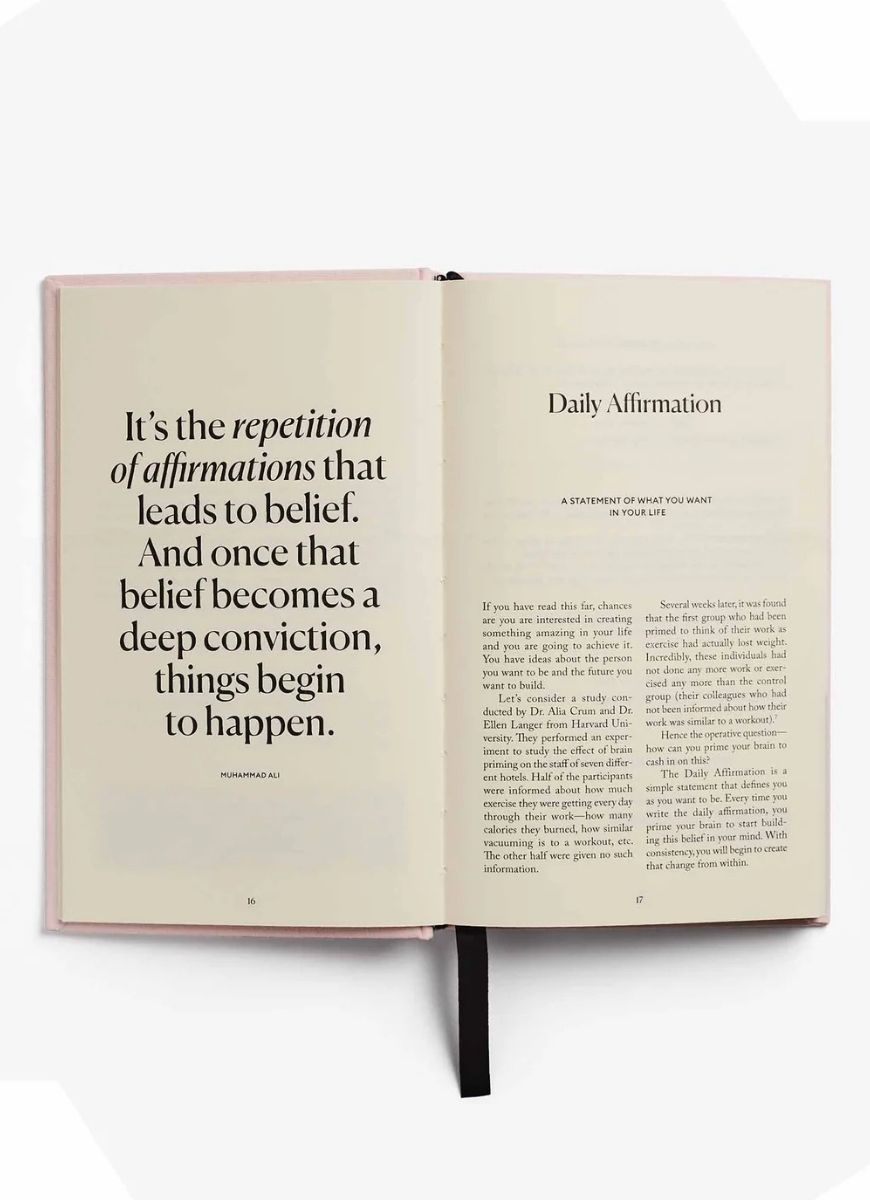 Intelligent Change The Five Minute Journal in Blush Pink Open to a Page With a Quote