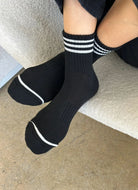 Le Bon Shoppe Girlfriend Socks in Black Shown on Feet Crossed