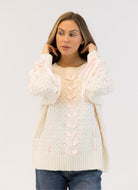 Lyla + Luxe Lydia Crewneck Pullover Sweater in White/Pink Ribbon Front View