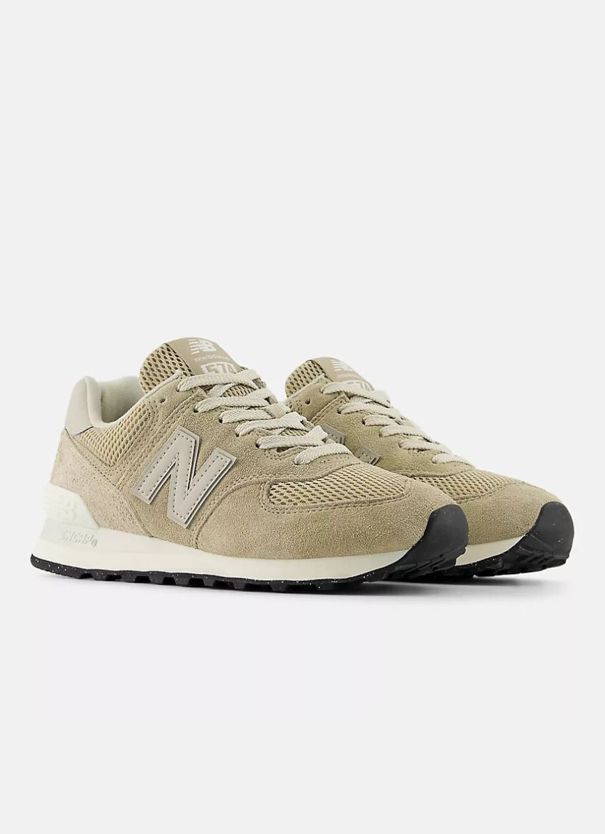 New Balance 574 Women's Sneaker in Beige Angled Side View