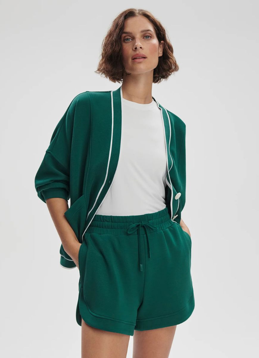 Varley Ollie High Rise Short 3.5" in Forest Front View With Hands in Pockets