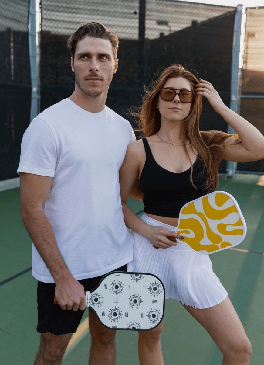 On Holiday Havana Pickleball Paddle Models Holding Paddles Shown on Pickleball Court
