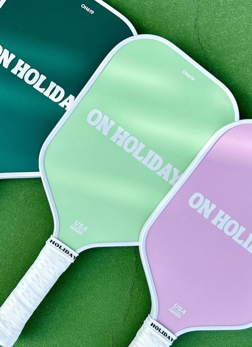 On Holiday Performance Lime Pickleball Paddle Close Up View of 3 Paddles Showing Logo Side