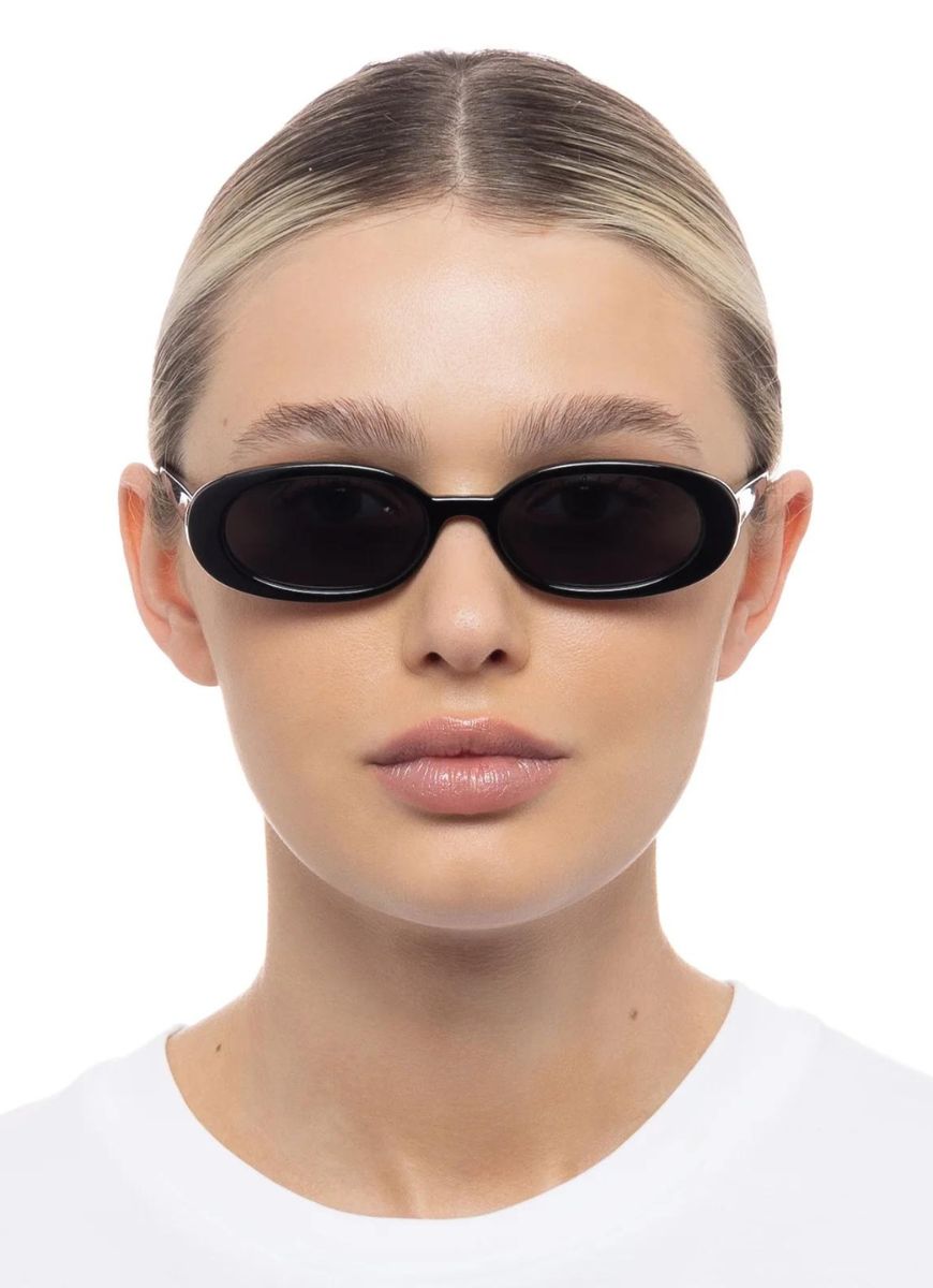 Le Specs Outta Love Sunglasses in Black Shown on Model Front View