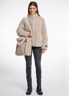 Rino & Pelle Brax Shopper Bag in Beige Shown on Model Carrying Bag Over Shoulder