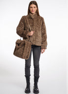 Rino & Pelle Brax Shopper Bag in Toffee Shown With Model Carrying the Bag Over Shoulder