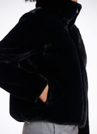 Rino & Pelle Sallie Faux Fur Jacket in Black Side View With Hand in Pocket