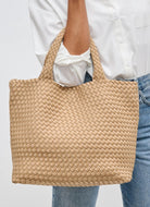SOL AND SELENE Sky’s The Limit - Medium Tote Bag in Nude Front View Shown on Models Arm