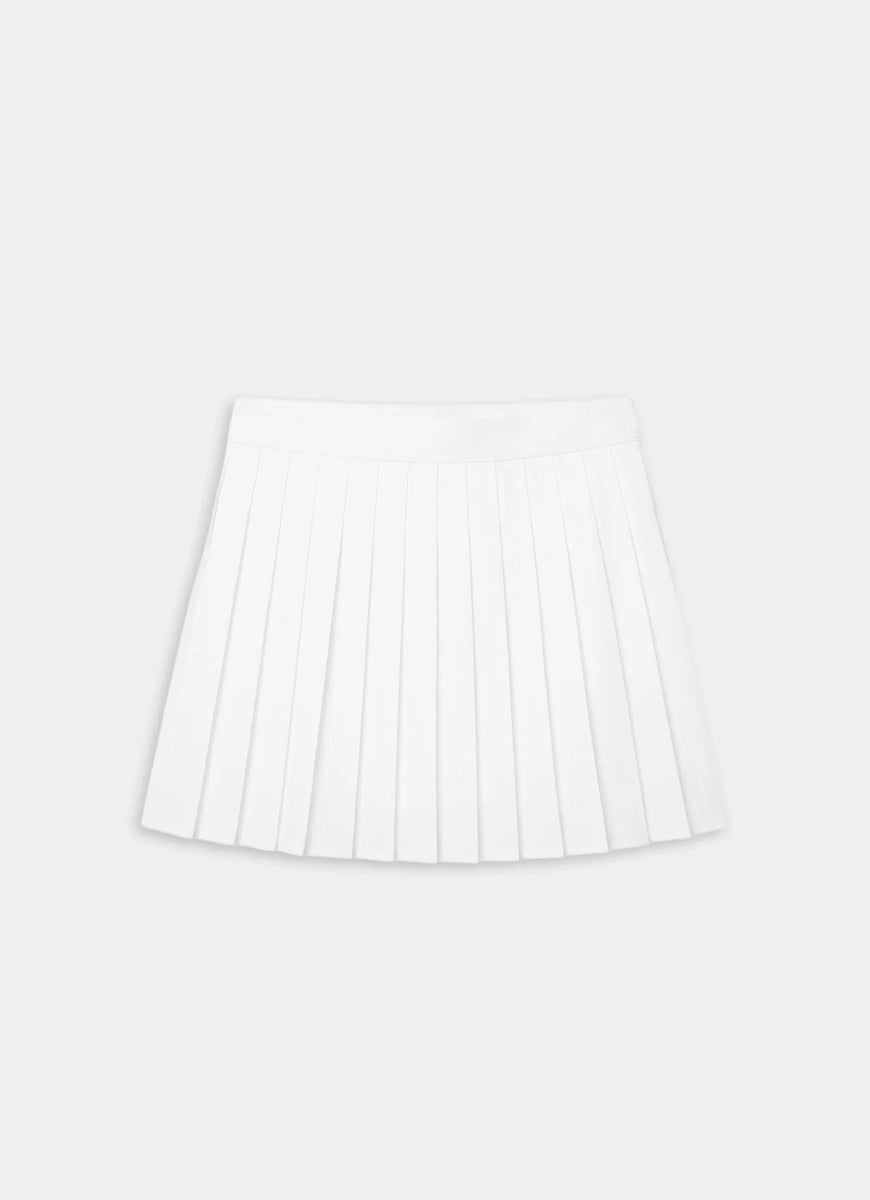 White pleated skirt on a light gray background