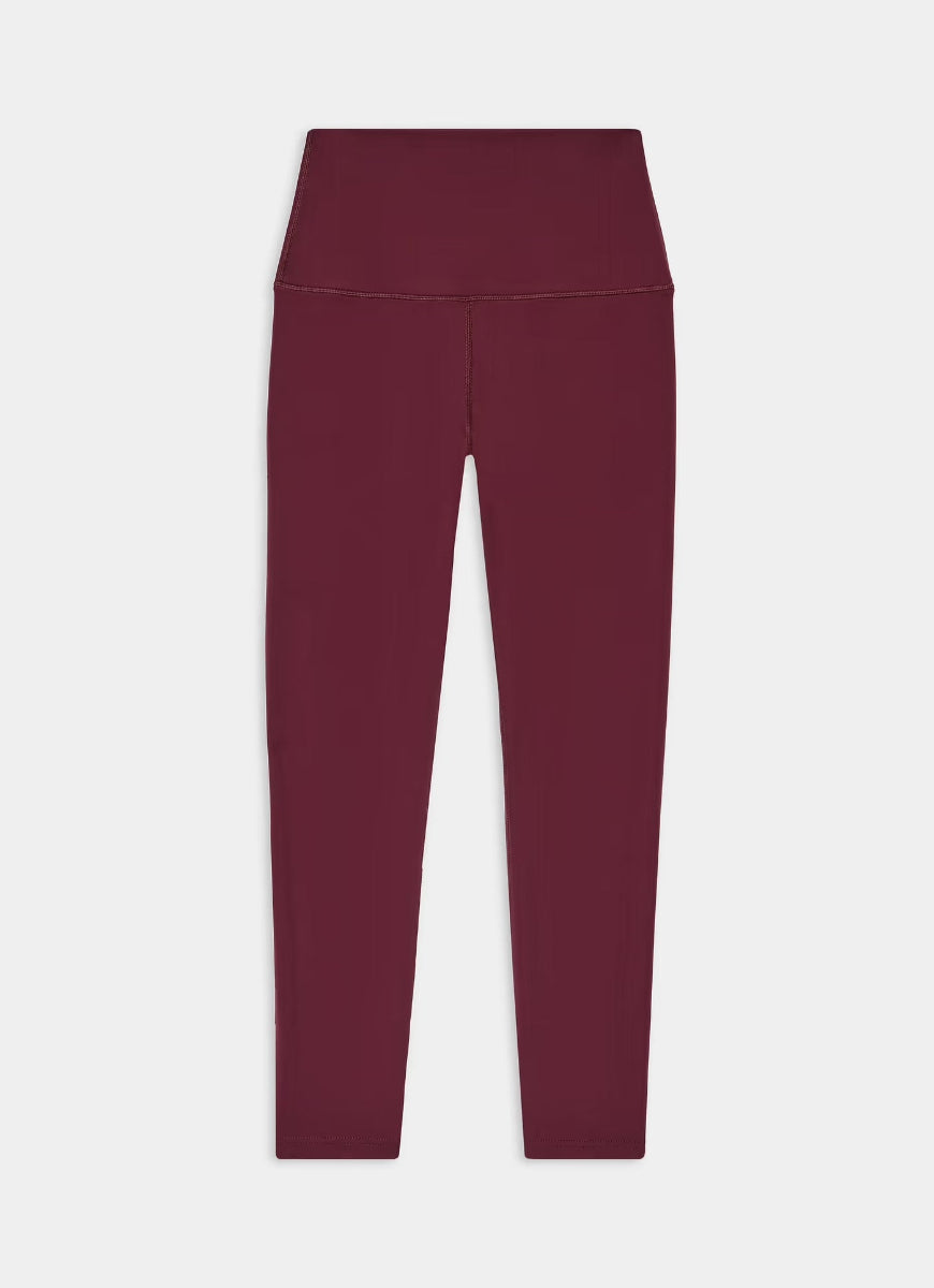 Maroon leggings on a light gray background
