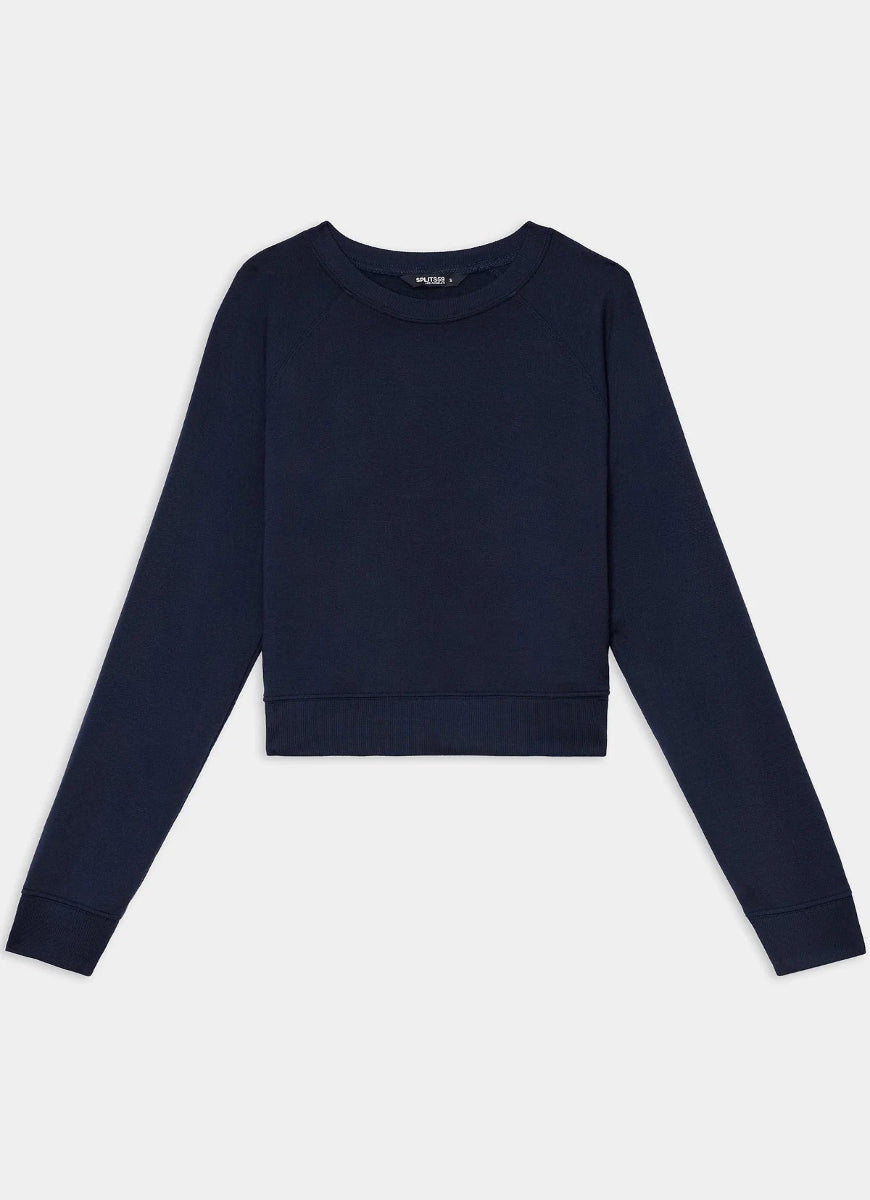 A dark navy blue long-sleeve crewneck sweatshirt laid flat against a light gray background.