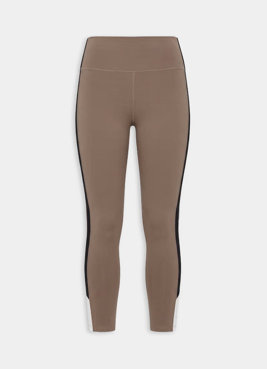 Brown leggings with black accents on a white background
