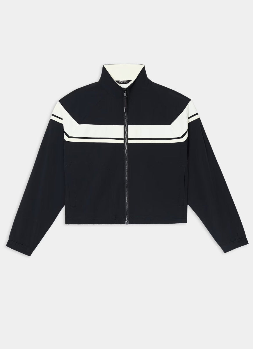 A cropped black zip-up jacket with contrasting white stripe details across the chest and shoulders, displayed flat against a light gray background.