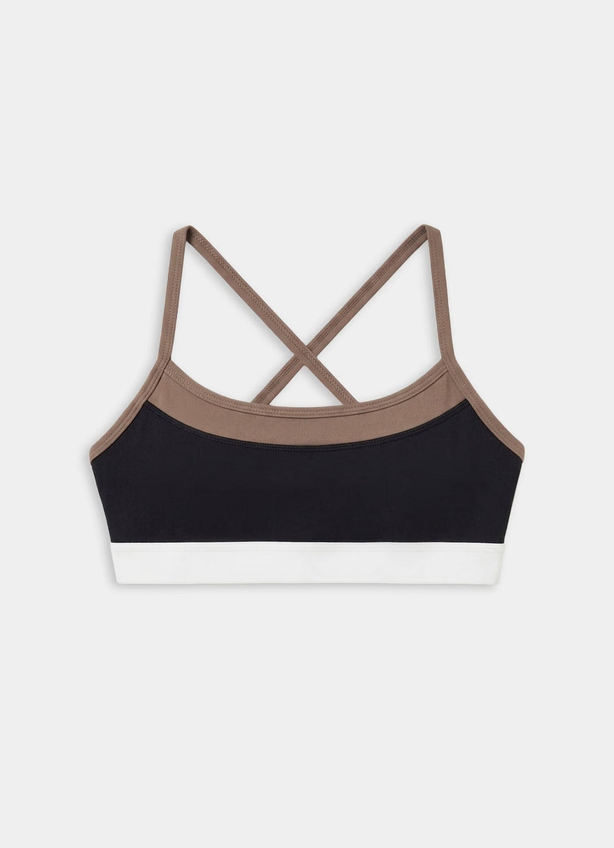 Black sports bra with brown straps on a white background