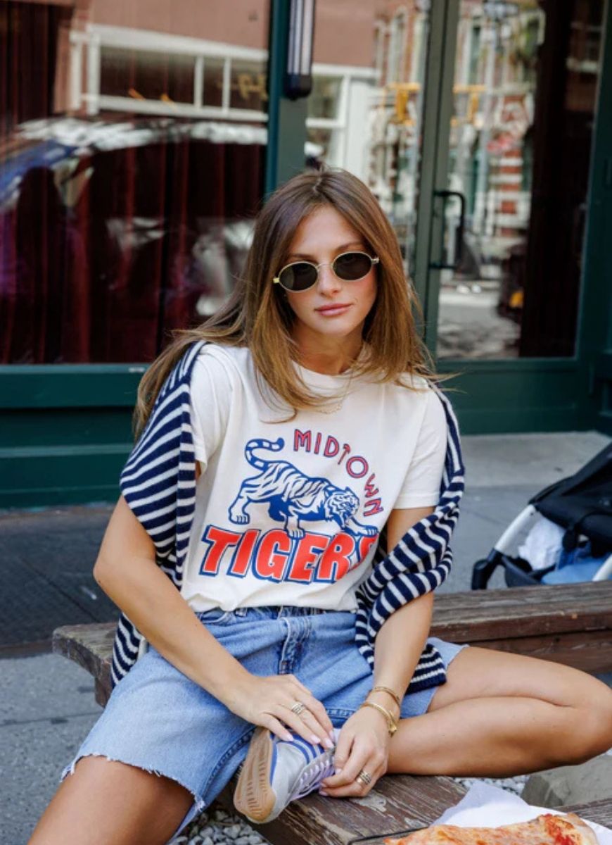 Sunny Somewhere Midtown Tigers Tee in Off White Front View With Model Sitting Down