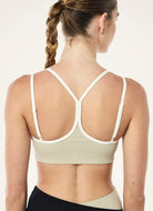 P.E Nation Terrace Sports Bra in Biscuit Close Up Back View
