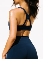 LSPACE Uppercut Sports Bra in Midnight Blue Back View