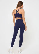 LSPACE Uppercut Sports Bra in Midnight Blue Full Length Back View