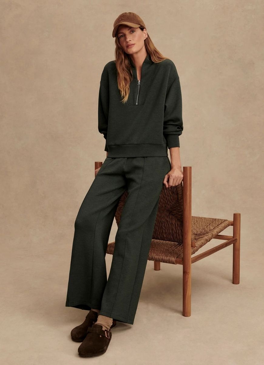 Varley Davidson Sweatshirt in Olive Marl Front View With Model Sitting on a Chair